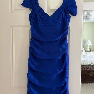 Carmen Marc Valvo bright blue cocktail dress.